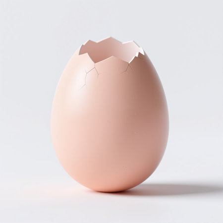 A minimalist illustration of a cracked eggshell, symbolizing new life and fragility, set against a clean white background with soft lighting and subtle shadowing.の素材