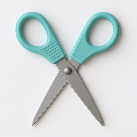 A pair of scissors with teal handles and silver blades, set against a clean white background, symbolizing precision and creativity.の素材