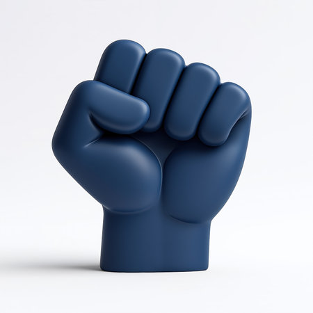 A minimalist digital illustration of a blue clenched fist on a white background, symbolizing solidarity, resistance, and empowerment, with a subtle shadow effect.の素材