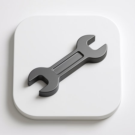 A gray wrench on a white square background with rounded corners, symbolizing tool or maintenance.の素材