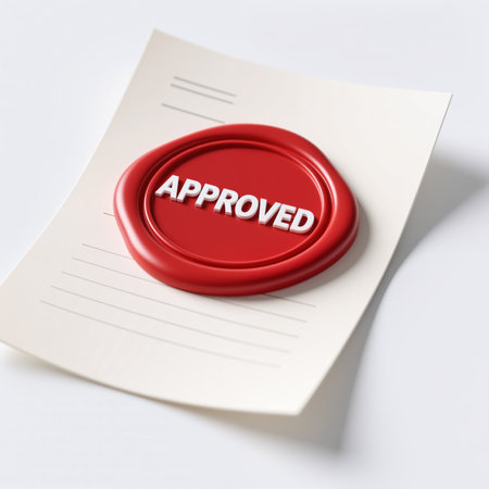 A red wax seal on a white document with APPROVED in bold white letters, symbolizing official validation and authenticity, against a clean white background.の素材