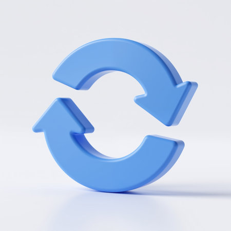 Smooth, matte blue circular symbol with arrowheads, signifying renewal, update, or repetition, on a plain white background with subtle shadow.の素材