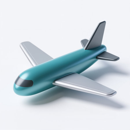 The teal airplane with silver wings and tail is set against a white background, showing a sleek and modern design with a shiny finish, symbolizing speed and travel freedom.の素材