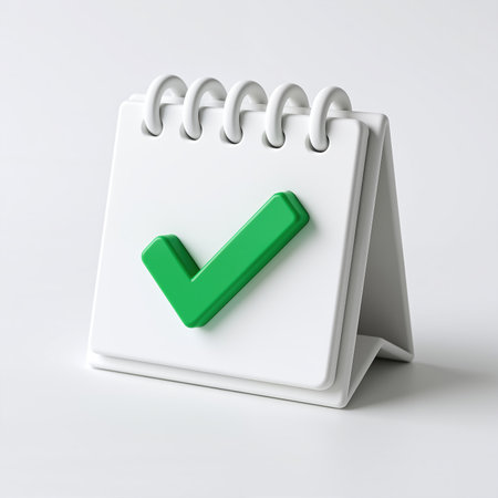 A minimalist illustration of a white desk calendar with a green checkmark, symbolizing confirmation, approval, or task completion, set against a plain white background.の素材