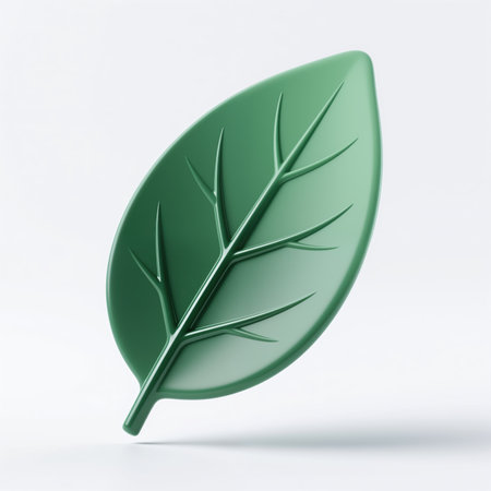 A shiny green leaf with veins, on a white background, symbolizing nature and growth, with a subtle shadow underneath.の素材
