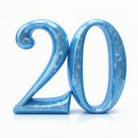 Celebrating a 20th birthday with a glittering blue number 20 against a white background.の素材
