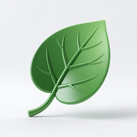 A sleek, matte, emerald green single leaf stands tilted and backlit, subtly shadowed on a white background giving smooth, even, plastic appearance.の素材