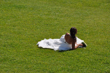 Bride on the grassの写真素材