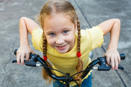 happy child on a bicycleの写真素材