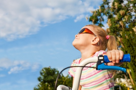 happy child on a bicycleの写真素材