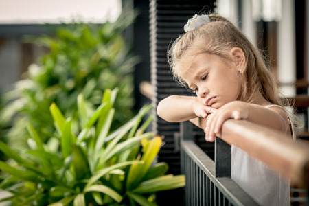 Portrait of sad little girlの写真素材