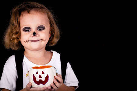 Cute little boy on Halloween partyの写真素材