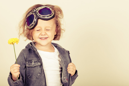 portrait of a little boy in a denim jacketの写真素材