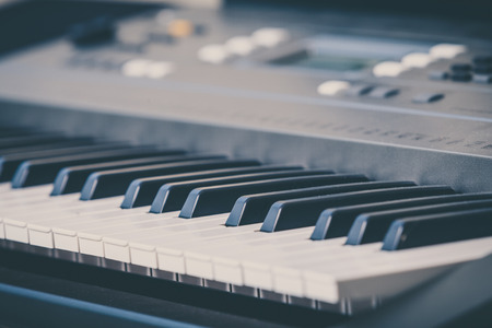 Electronic musical keyboard synthesizer close-up