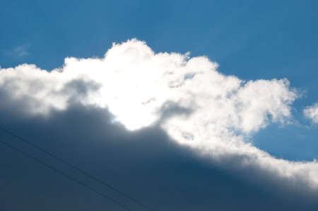 dark rainy cloud grey color with blue sky at cityscape with no people as natural backgroundの写真素材