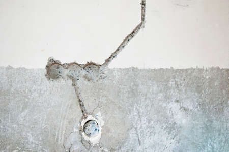 electrical box three sockets. lay wires wall. hole in wall for socket. repar and construction....