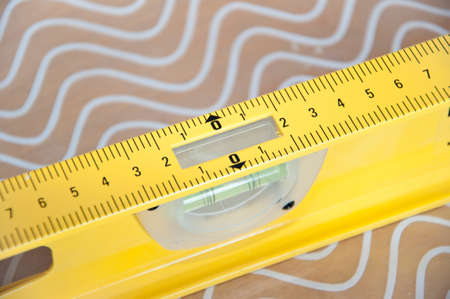 bubble level tool. spirit level with swivel capsule. measuring equipment used in repair and...