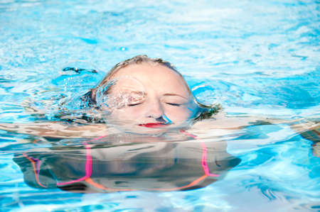 woman swimming under sea water. summer vacation. underwater.の写真素材