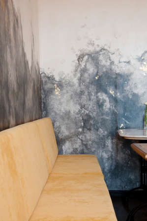 Sofa furniture in cafe or restaurant loft interior.