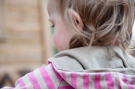 children's day. happy childhood. small child girl outdoor. little kid. preteen daughter has birthday. back view.の写真素材