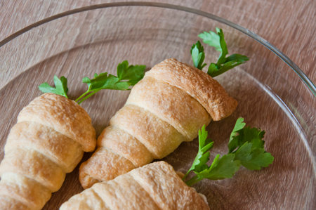 food appetizer fresh bakery and pastry snack. easter french croissant. bakehouse with homemade buttery. carrot bakery.の写真素材