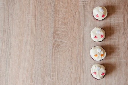 sweet food. delicious cupcake food. yummy and sweet dessert. confectionery. birthday cake. frosting cupcake with cream. homemade cup cake with sprinkles. cupcake dessert. yummy muffin. banner.の写真素材