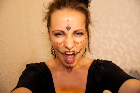 Halloween makeup of catrina woman. catrina skull for woman on Halloween. Catrina Calavera skull. day of the dead. happy halloween. woman portrait with spooky makeup.の写真素材