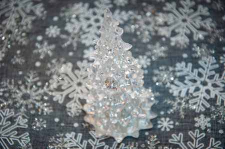 Christmas tree decoration. Decoration for New Year holiday celebration. Happy New Year. Christmas Tree Background. Beautiful Christmas gift near fir tree in room. Festive Christmas scene.の写真素材