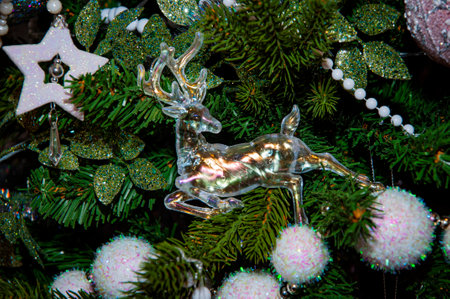 Merry Christmas. Christmas tree decorated with Xmas festive decoration. Christmas shopping sale. New Year Banner Composition. Decoration for New Year holiday celebration. Promotional sale. Deer.の写真素材