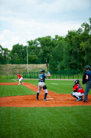 Kyiv, Ukraine - July 23, 2023: Baseball game with Ukrainian and Cuban sport team who support and are...