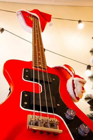Decorated Xmas electric guitar. Christmas music playlist. Merry Christmas. Happy New Year. Xmas...