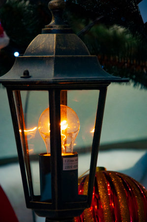 Street lantern. December holiday light bulb. Decorated Xmas lamp. Christmas lantern lamp. Merry...