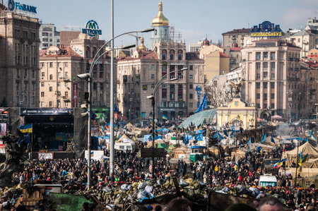Kyiv, Ukraine- February 24, 2014: Maidan 2014 revolution demonstration Euromaidan in Kyiv. Ukrainian barricade for freedom. Governmental opposition. Rebellion war and crisis. Crowds of people.のeditorial素材