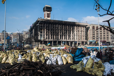 Kyiv, Ukraine- February 24, 2014: Maidan 2014 revolution demonstration Euromaidan in Kyiv. Ukrainian barricade for freedom. Governmental opposition. Rebellion war and crisis. Terrible day.のeditorial素材