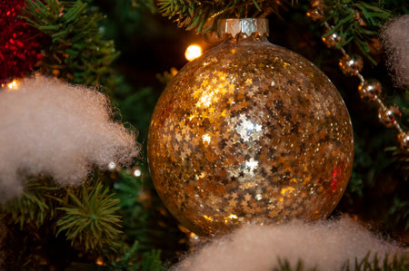 Decoration for New Year holiday celebration. Christmas tree decorated with Xmas festive decoration. New Year tree Christmas eve. December holiday in winter.の写真素材