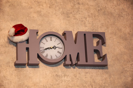 Xmas shopping time. Christmas home decoration. Santa Claus. Happy new year 2025. Countdown clock with Santa hat. Home clock. Christmas time. Home goods for Xmas. Holiday sale. Christmas shopping.の写真素材