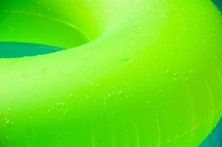 Summer vacation. Relaxing at the pool. Summer resort vacation. Recreation concept. Inflatable ring...