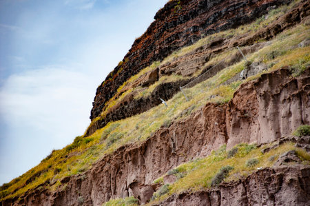 Rock formation with erosion. Landscape with rock formation. Nature formation. Geological rock. Tourism and travel destination, Greece. Geology. Volcanic rock nature. Barrier formationの写真素材