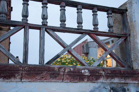 Wooden fence of balcony on building architecture. Architectural detail