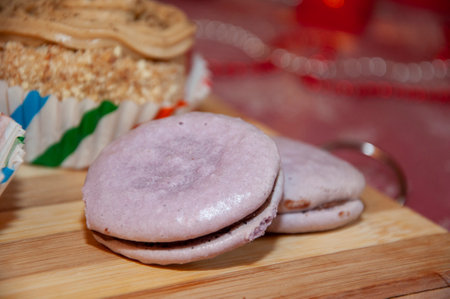 Sweet tooth. Yummy Christmas. Homemade yummy cookie. Xmas Eve with family at home. Macaron dessert for Christmas. French macaron. Macaroon cookies. Sweet French macaroon. Chewy texture.の写真素材