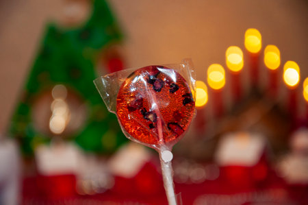 Caramel candy shop. Sweet tooth. Tooth fairy. Yummy lollipop. Organic homemade lollipop. Handmade yummy lollypop. Christmas candy. Lollipop for Christmas. Lollypop sugar candy on stick. Bright swirl.の写真素材