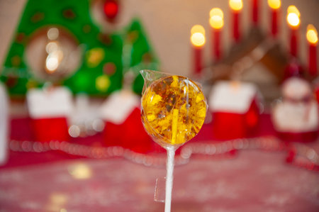 Lollipop for Christmas. Lollypop sugar candy on stick. Caramel candy shop. Sweet tooth. Tooth fairy. Yummy lollipop. Organic lemon homemade lollipop. Handmade yummy lollypop. Christmas candy.の写真素材