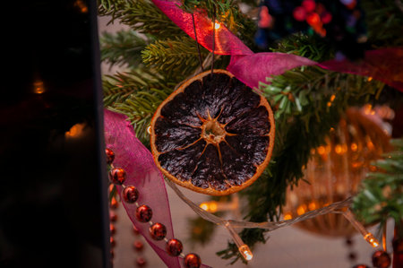 Xmas party 2026. Christmas tree decoration at home for Xmas with colorful decor and lights.の写真素材