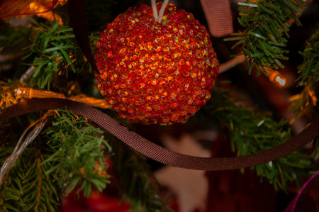 Xmas party 2026. Christmas tree decoration at home for Xmas with colorful decor and lights.の写真素材
