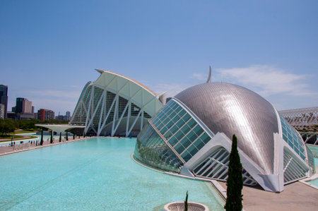 Travel to Valencia. City of arts and sciences. Structural symmetry. Travel destination. Valencia geometric architecture landmark. Geometric architecture sightseeing. Touristic city arts science.の写真素材