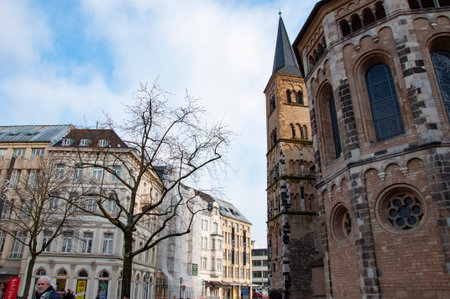 Bonn, Germany - February 27, 2024: Architectural building. Historic city building. Church architectural street. Bonn Minster. Roman Catholic church. Bonn architectural city. German city architecture.のeditorial素材