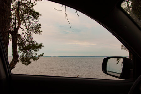 Car window road trip. Travel summer vacation. Sea adventure journey. Wanderlust. Traveling on sea by...