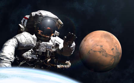 Giant astronaut and little Mars. Image in 5K resolution for desktop wallpaper.