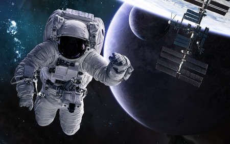 Astronaut, station, deep space planets. Science fiction.