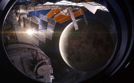 The orbit of the moon. View from the porthole of a space station. Science fiction.の写真素材